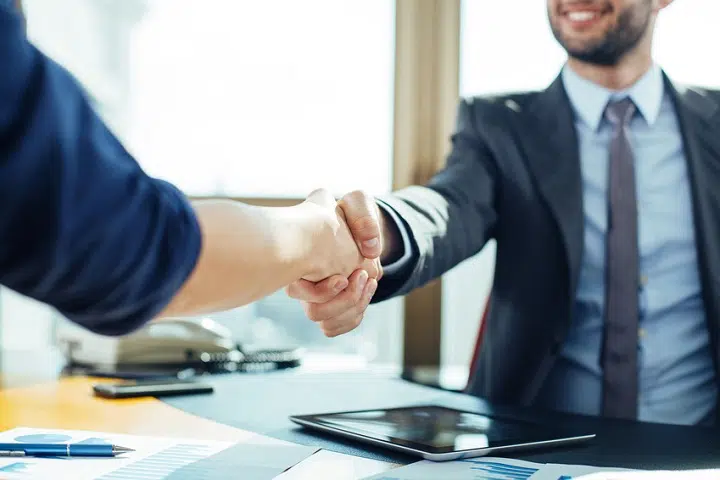 Close up of business handshake in the office