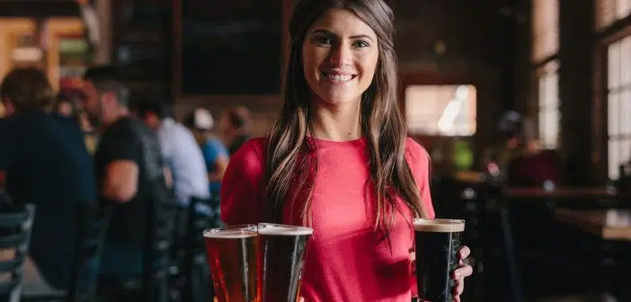 woman holding 3-piece cups